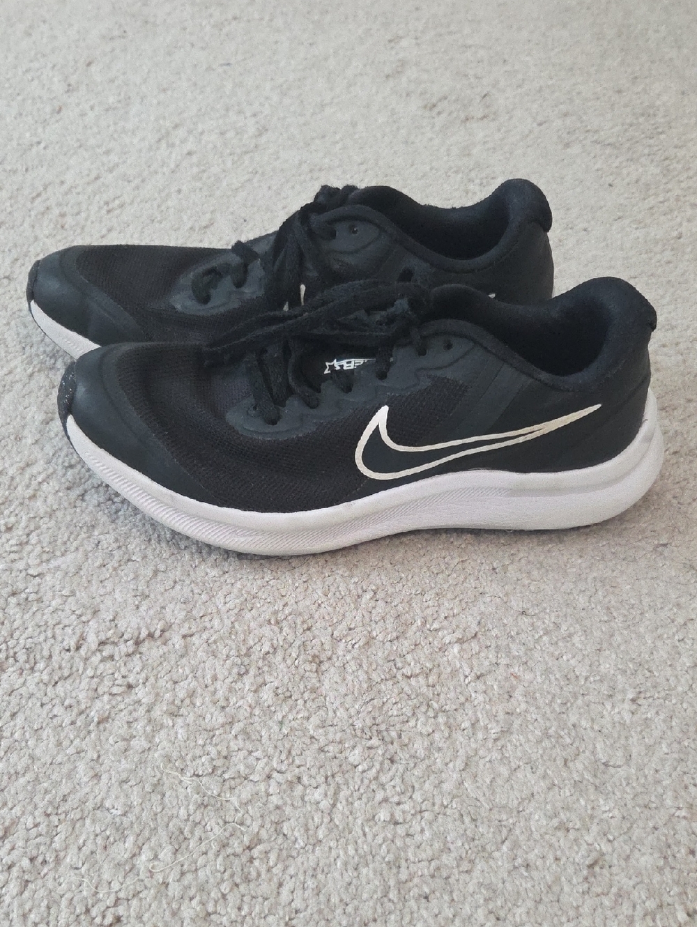 Nike Black and White Athletic Sneakers with Swoosh